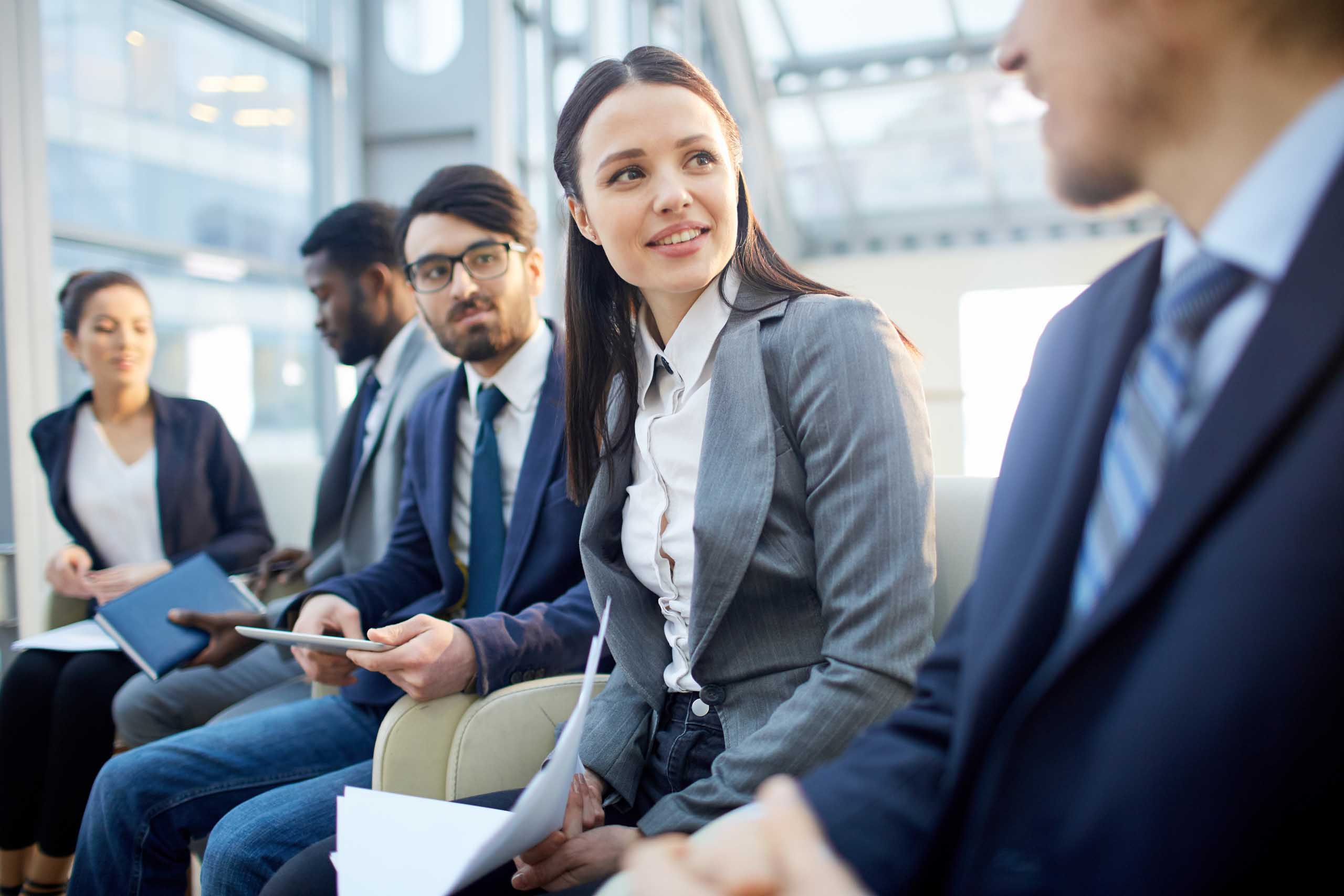 Business People Interacting in Row