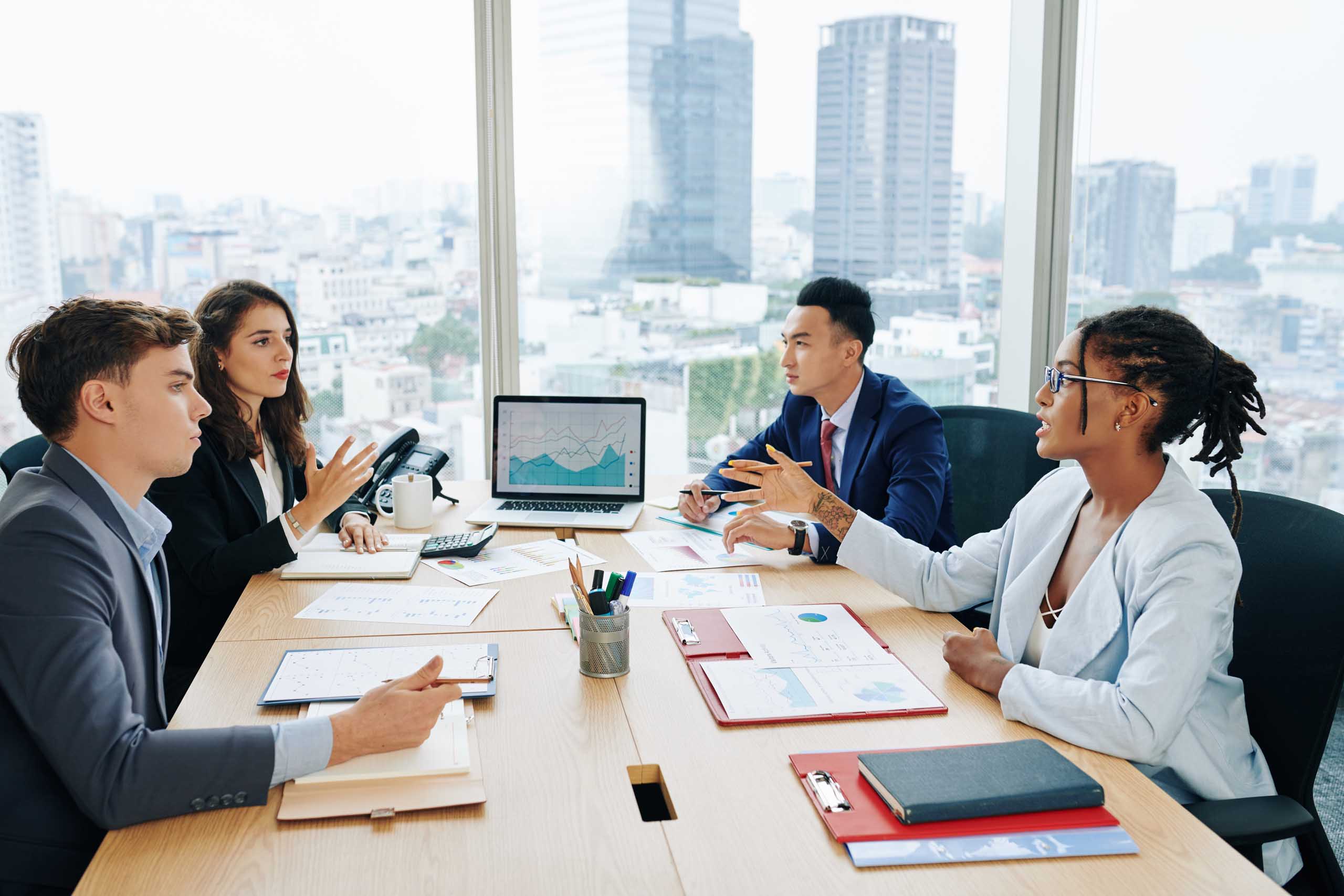 Business team at big office table